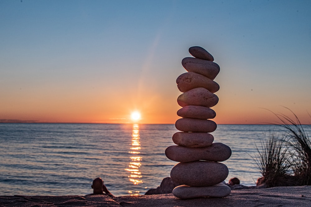 a stack of rocks on a beach