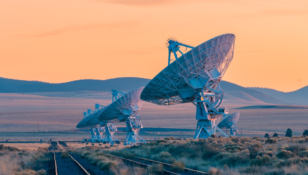 a group of satellite dishes