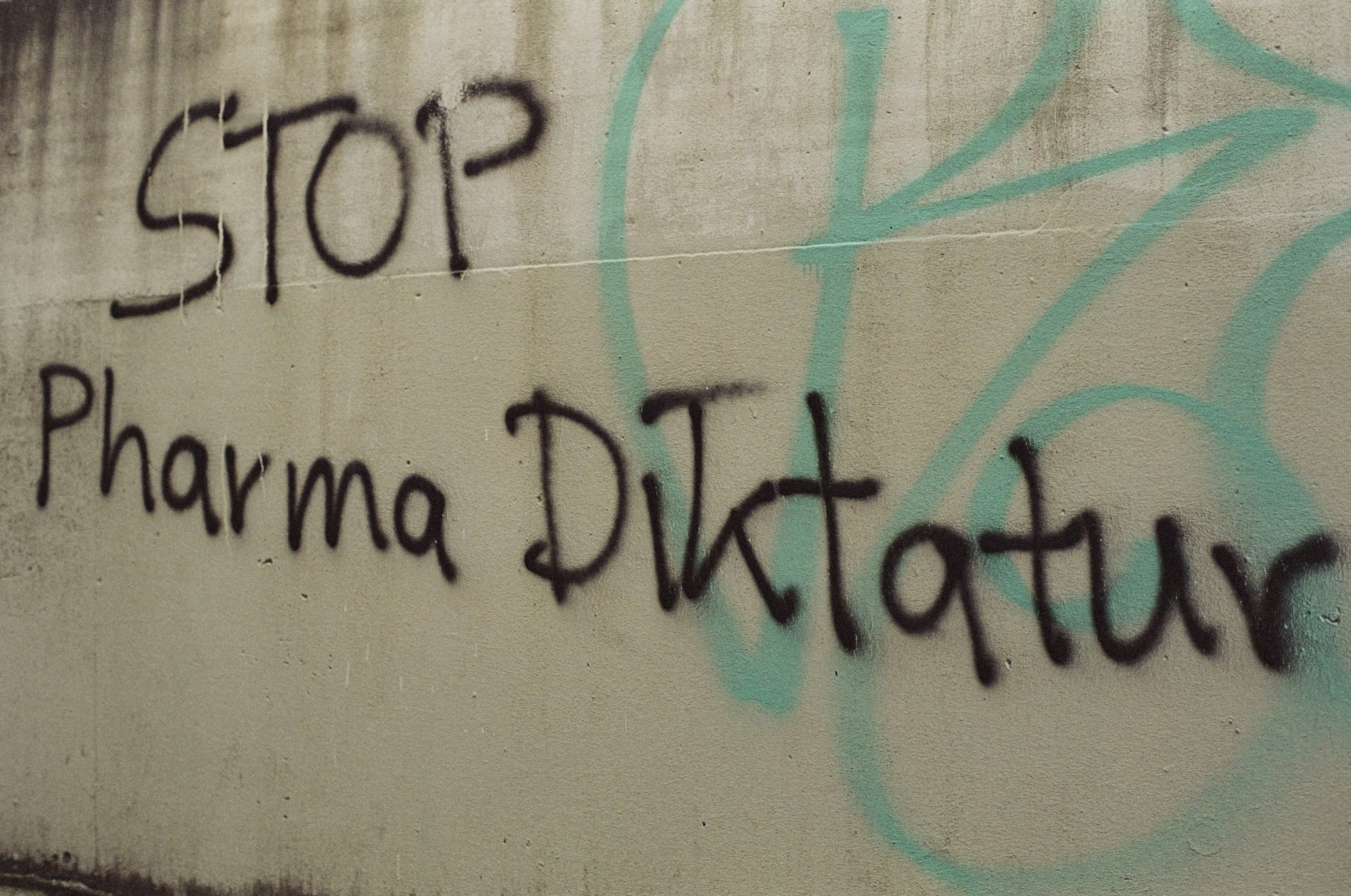 STOP Phama Diktatur (Dictatorship). Leica R7 (1994), Summilux-R 1.4 50mm (1983). Hi-Res analog scan by www.totallyinfocus.com – Kodak SO-553 100 (expired 2003)