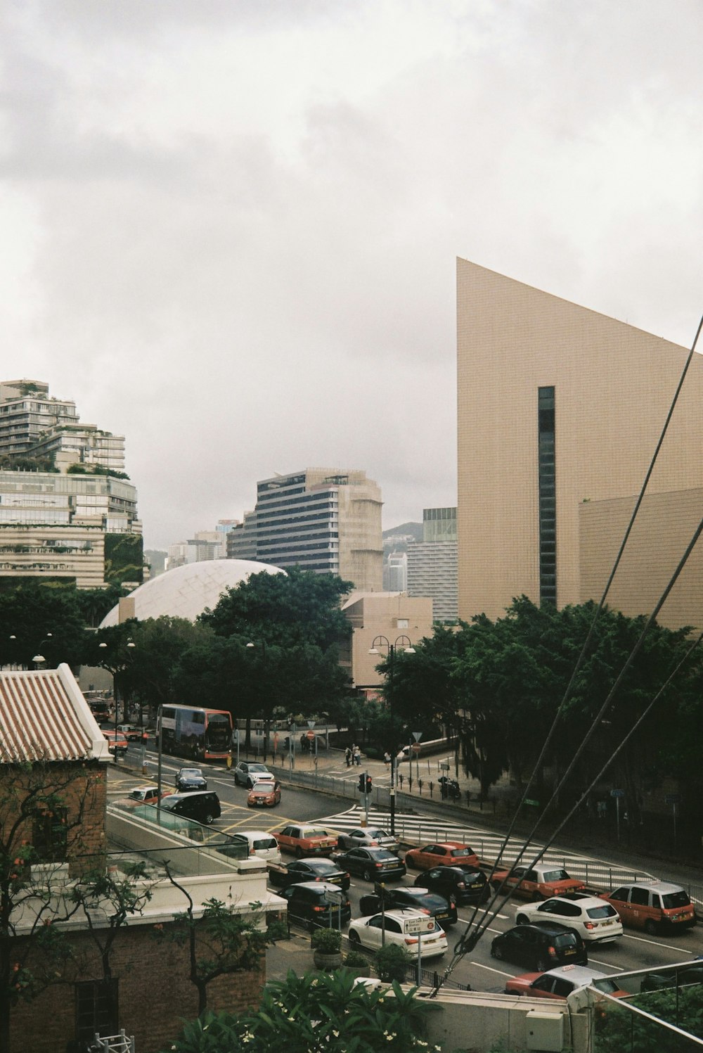 a city street with cars and buildings