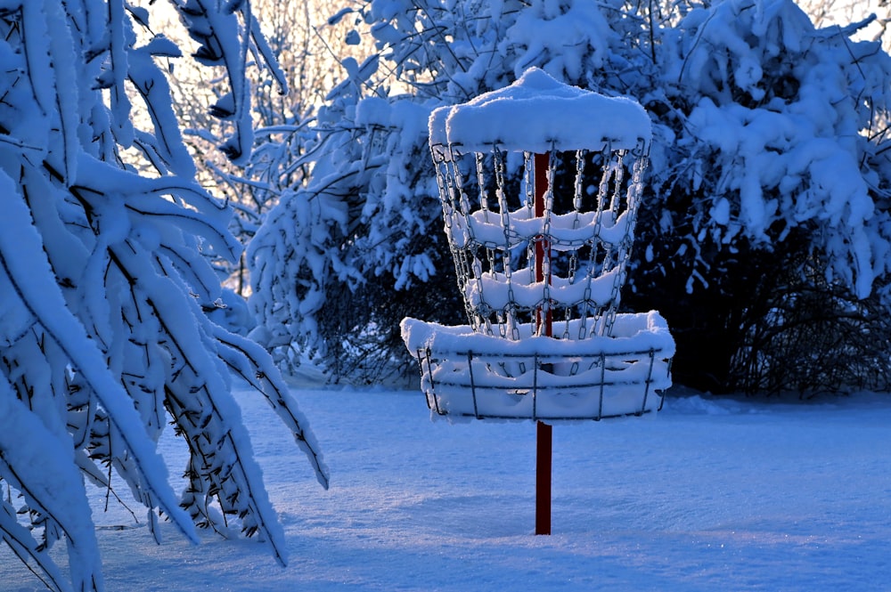 a birdhouse in the snow