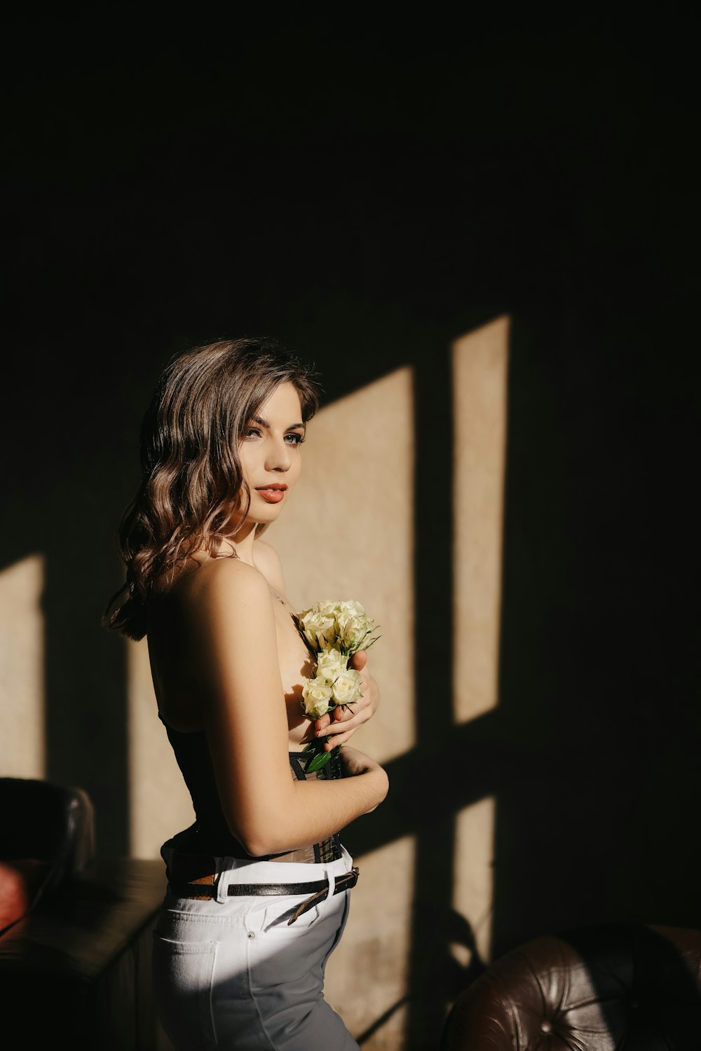 a woman holding flowers