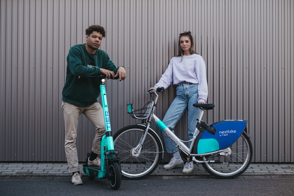 a man and a woman with a bicycle