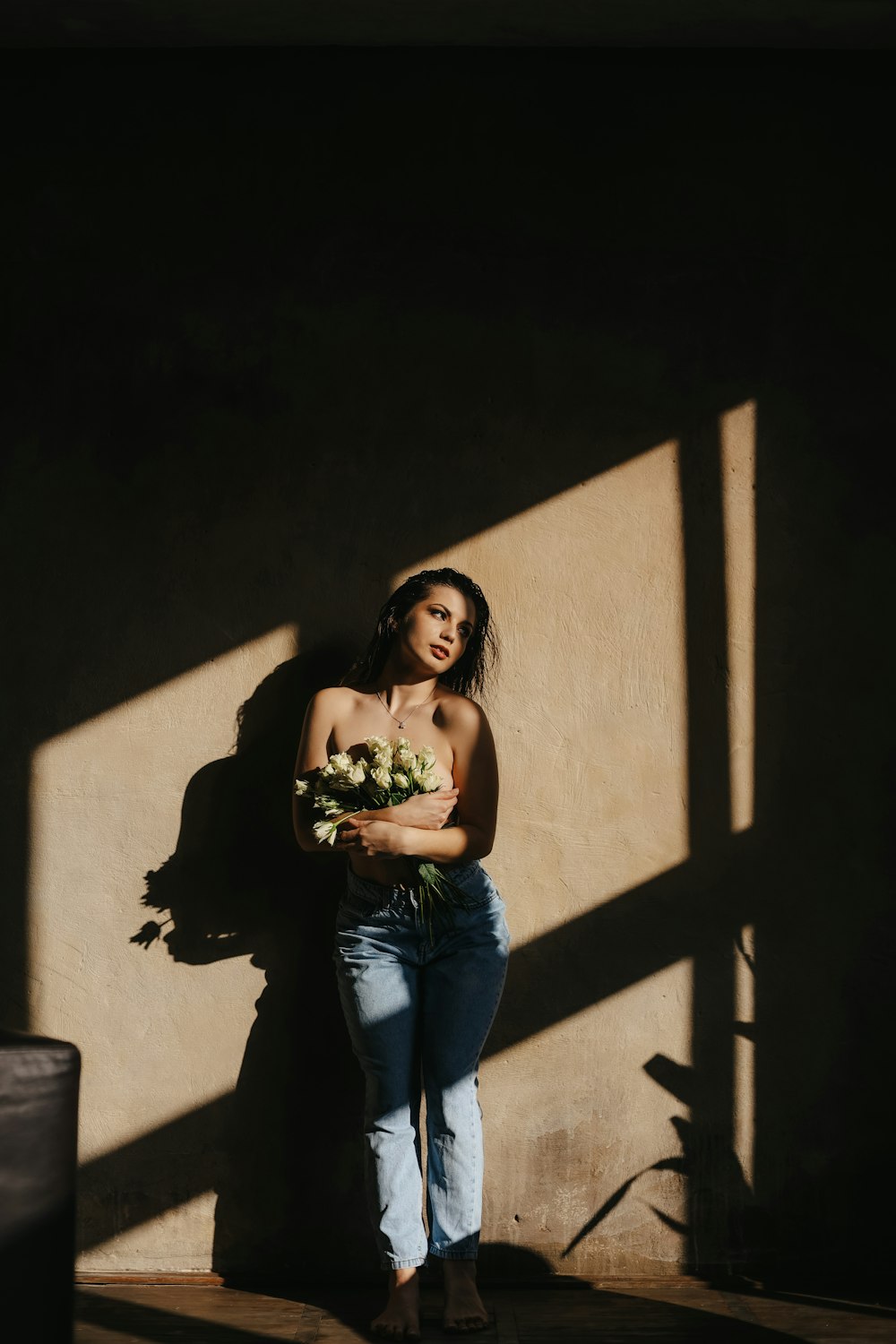 a woman holding a bouquet