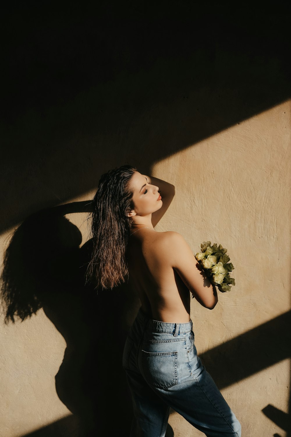 a person with the hair blowing in the wind