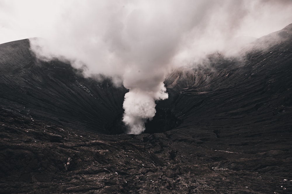 a volcano erupting with smoke