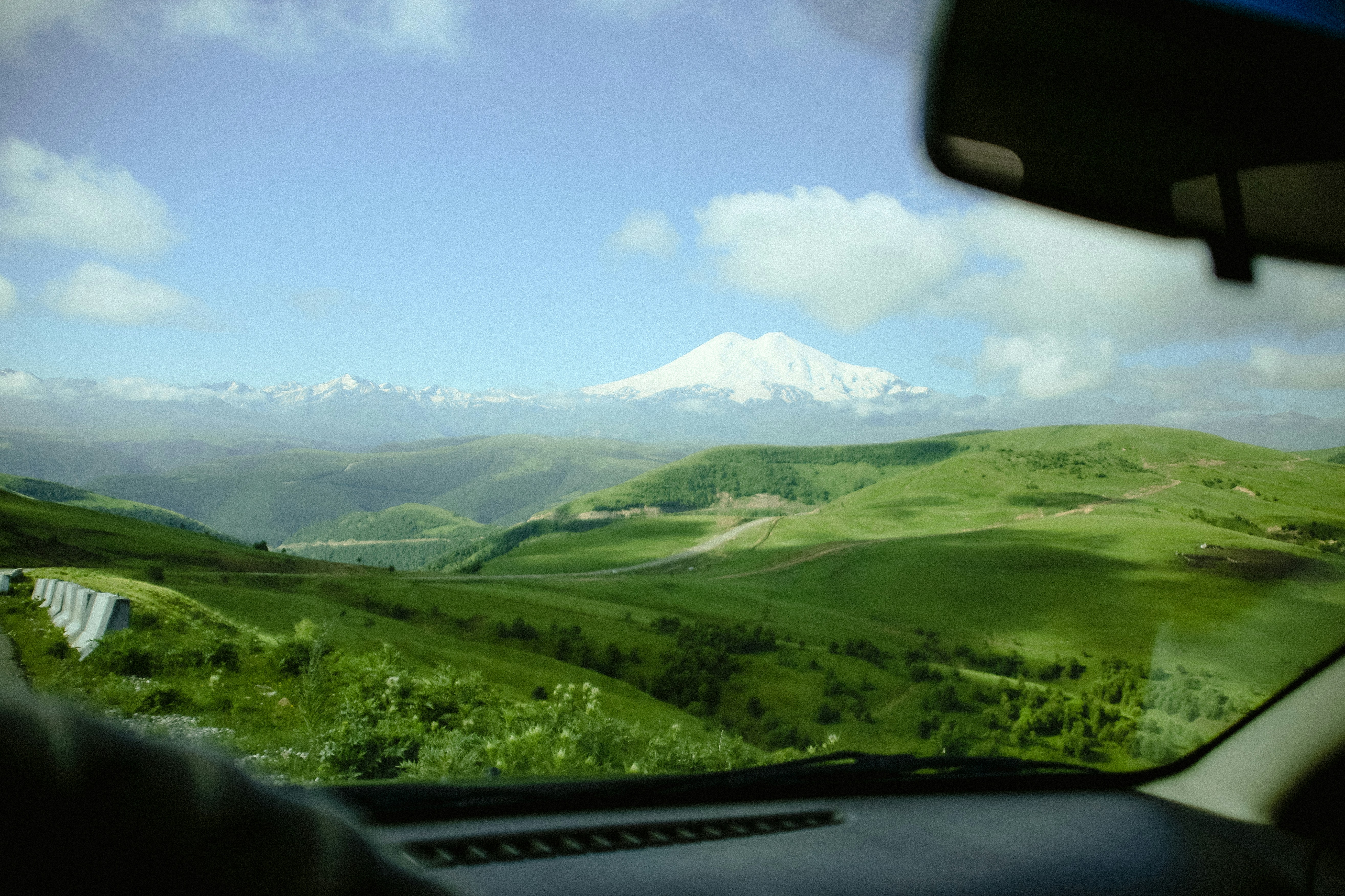 a view of a mountain from a plane