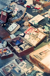 a group of boxes and objects on the floor