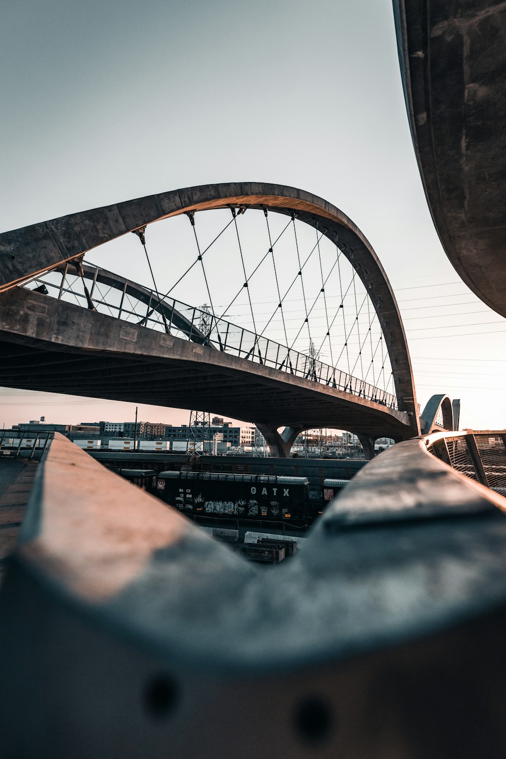 a bridge with a train going under it