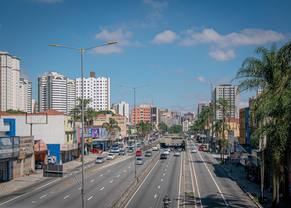 a city street with cars and buildings