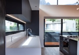a kitchen with a large window