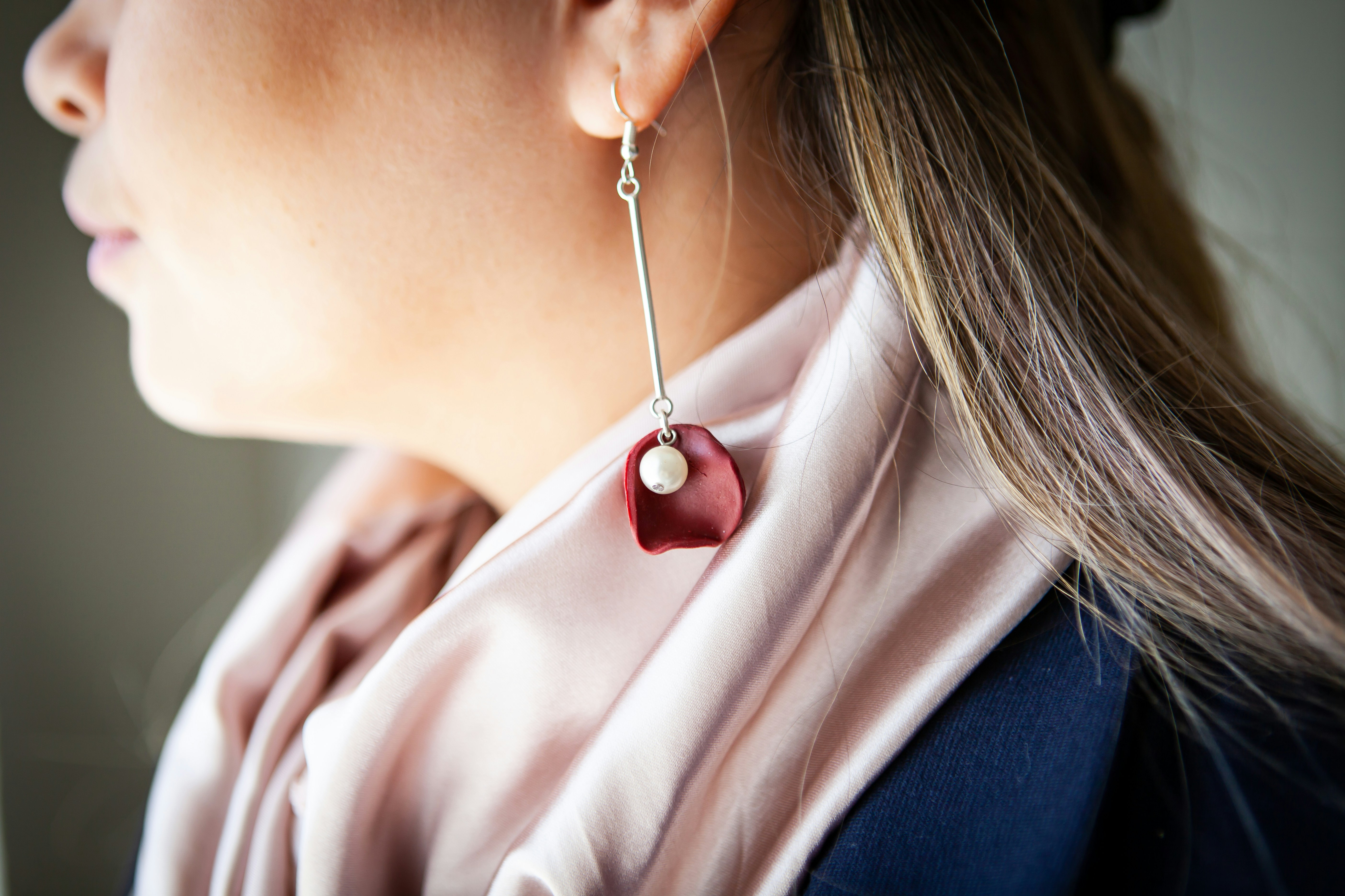 A colorful patterned silk scarf elegantly draped.