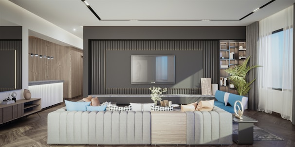 A cozy modern living room decorated with blue accents and minimalist furniture.