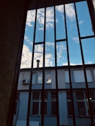 Outdoor view of a building with climate control vents visible.