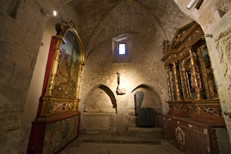 a room with a large painting on the wall