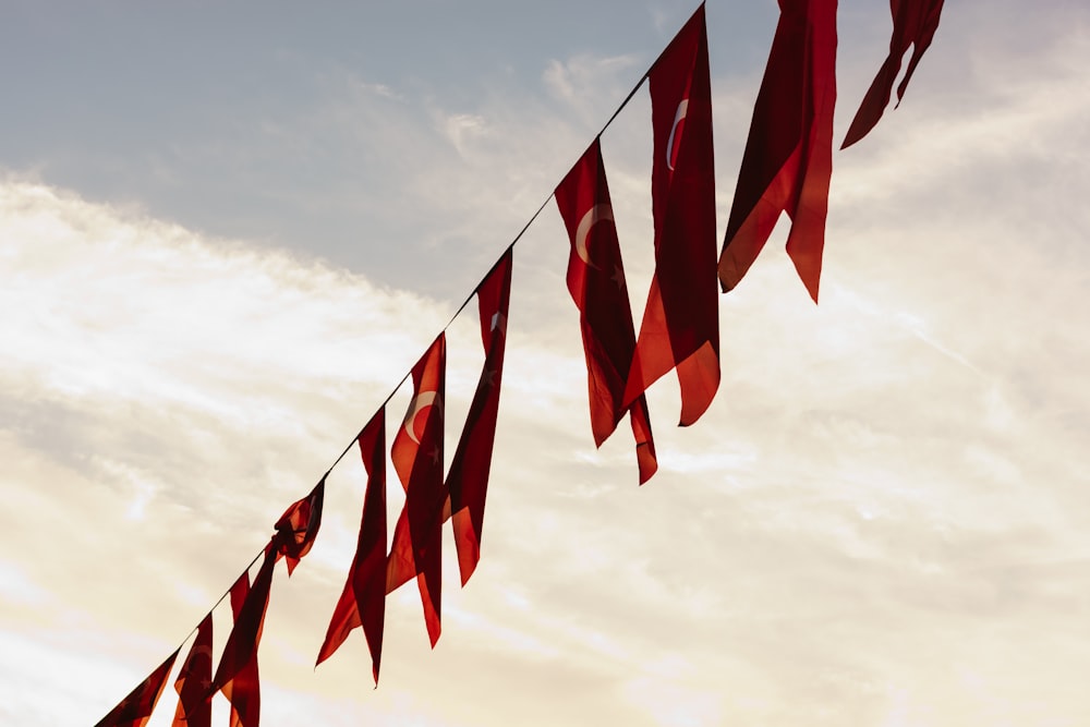 a group of red and white flags