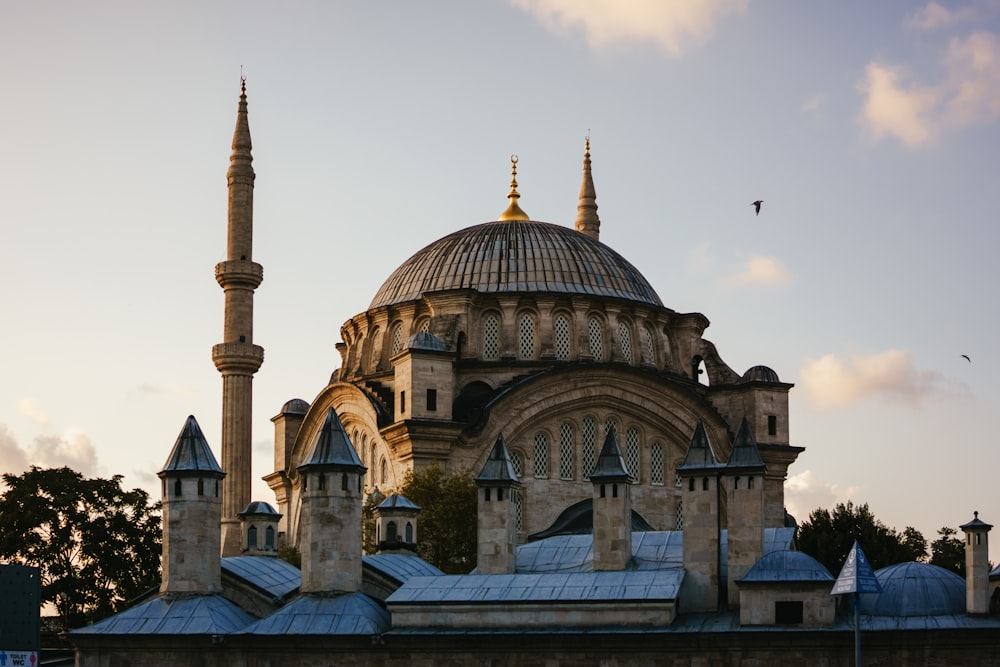 a large building with towers with Nuruosmaniye Mosque in the background