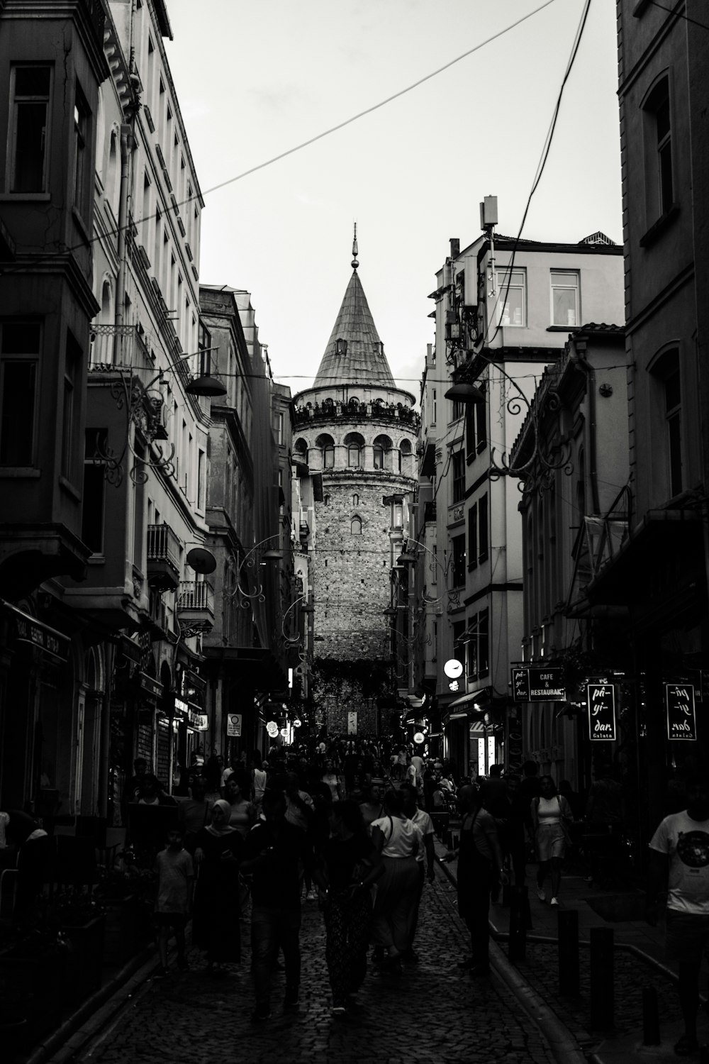 a group of people walking down a street