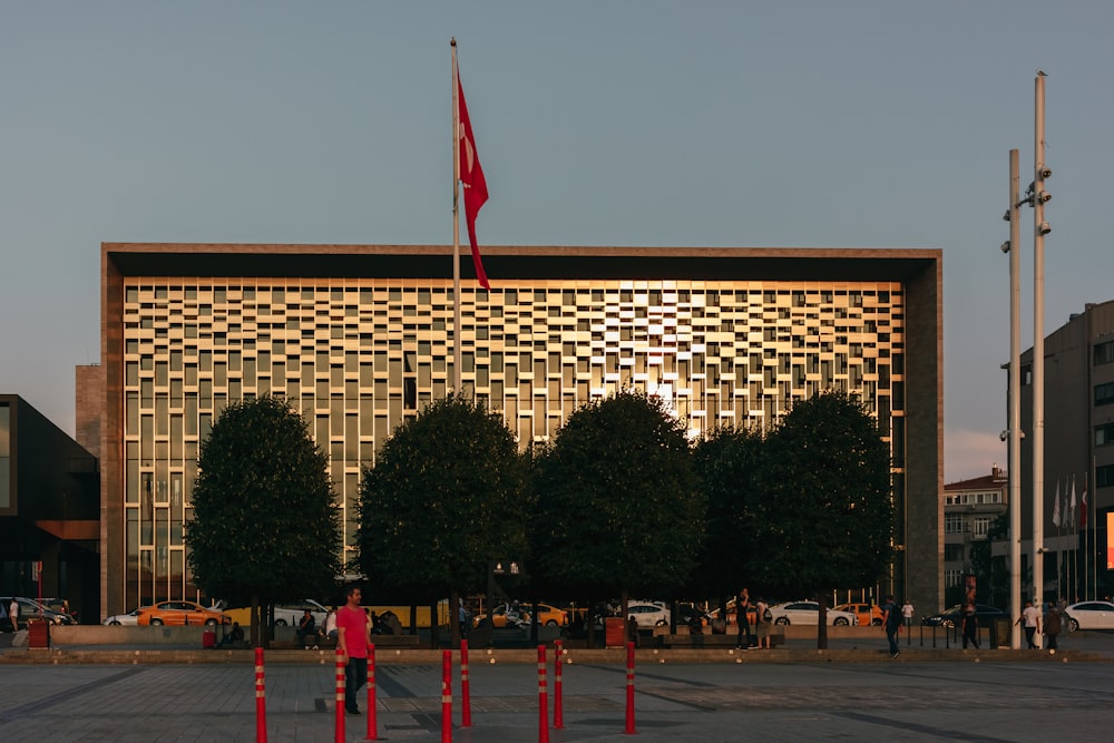 a large building with a flag on top