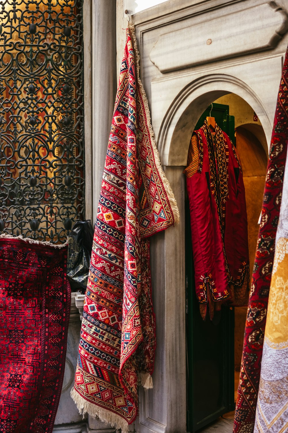 a group of ties swing from a door