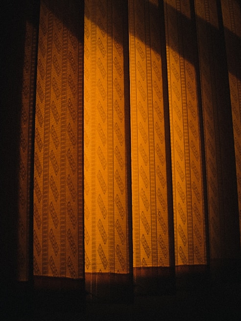 Bold patterned curtains adding character to a modern living room