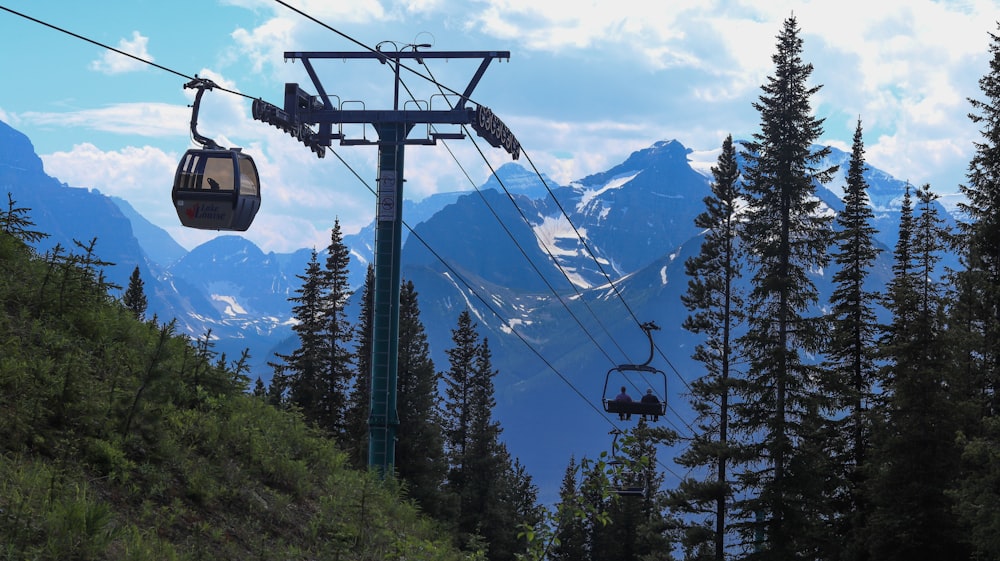 a ski lift going up a mountain
