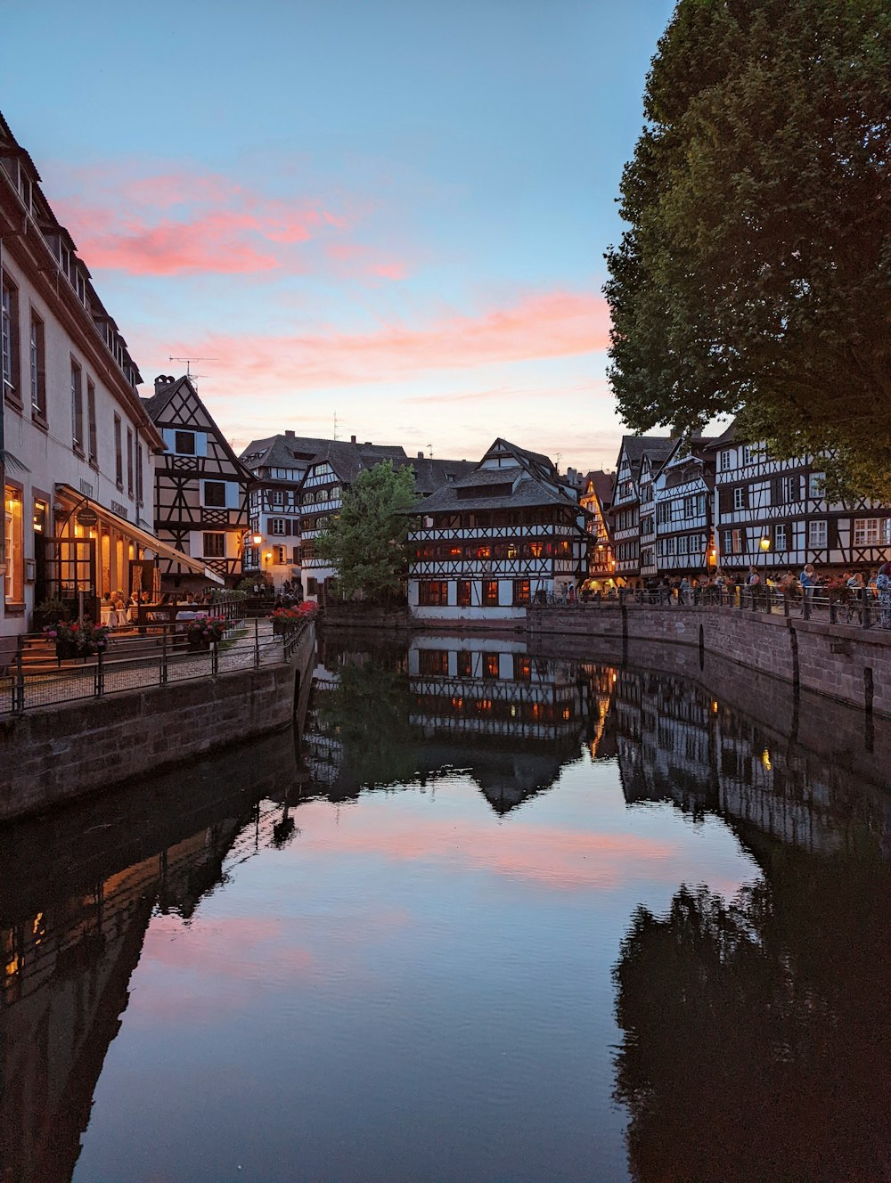 a body of water with buildings along it