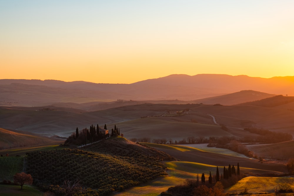 a landscape with hills and trees