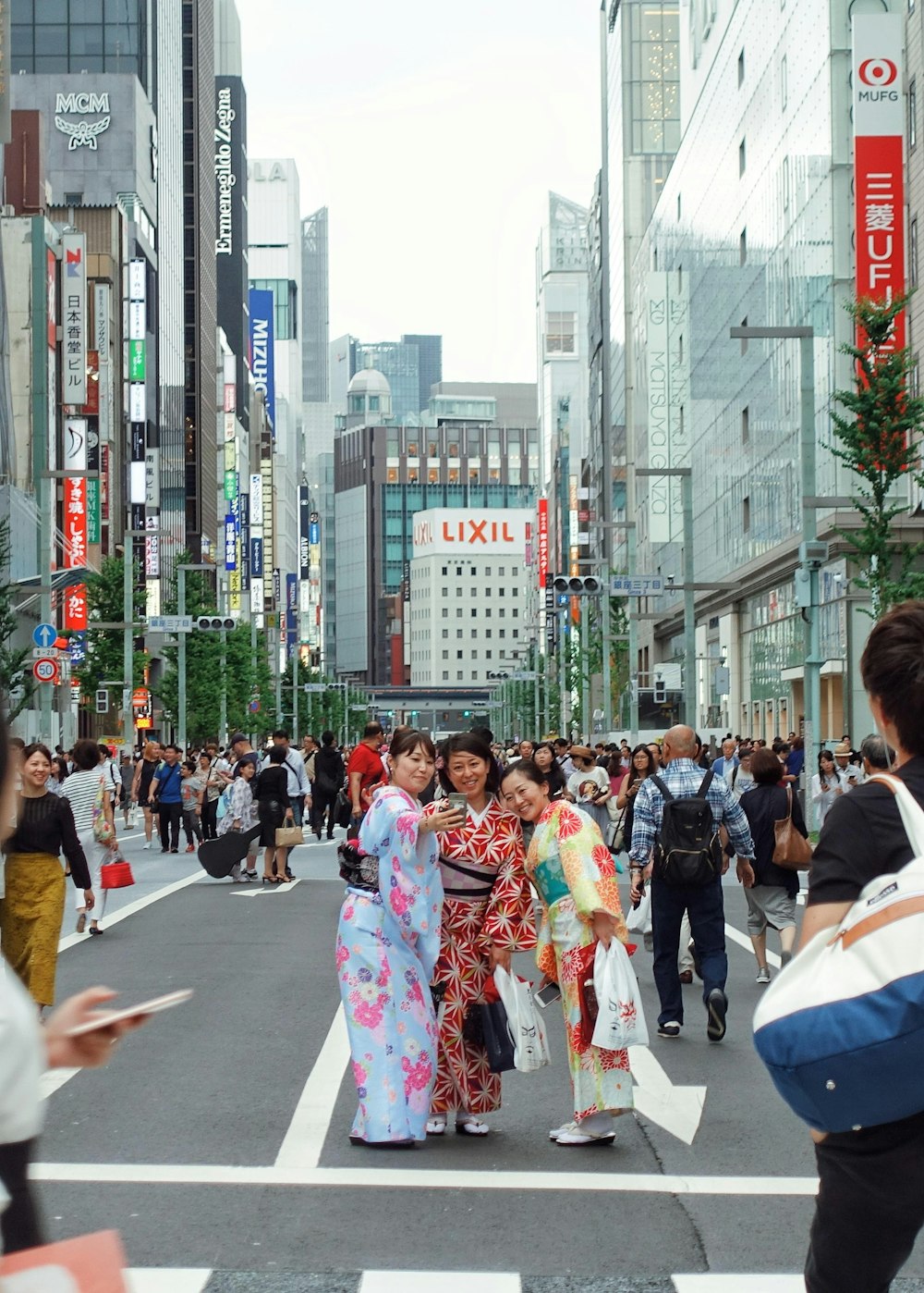 a group of people in a street