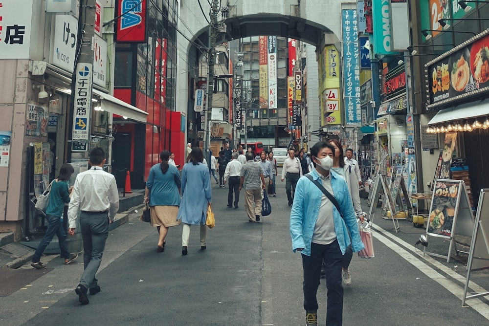 people walking in a busy street