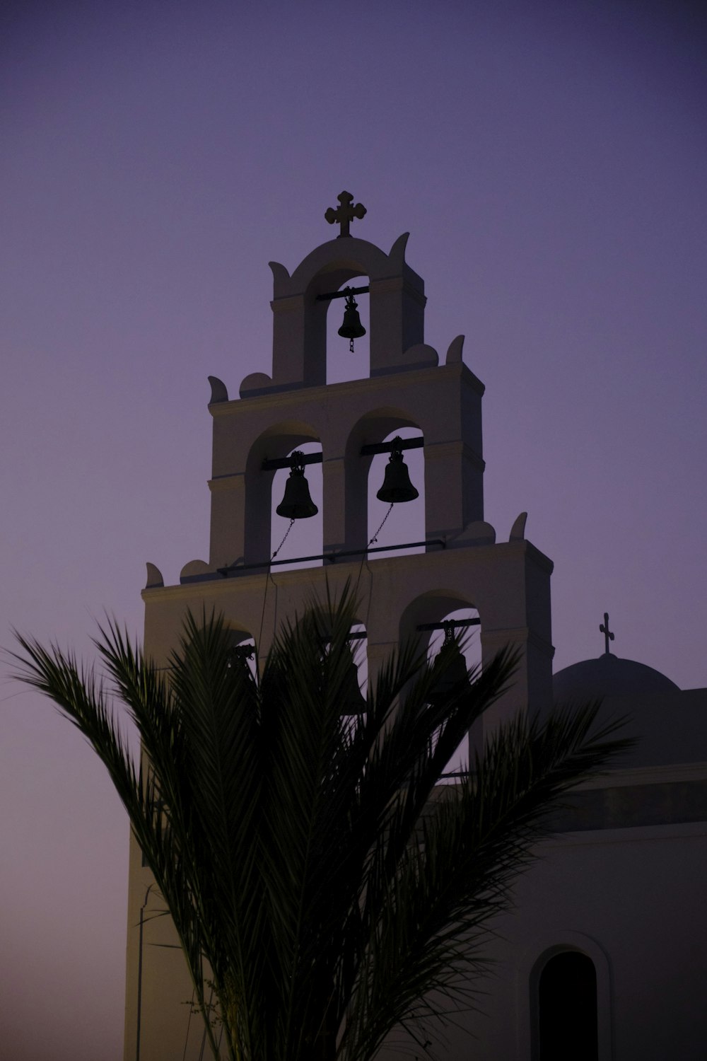 a bell tower with a bell