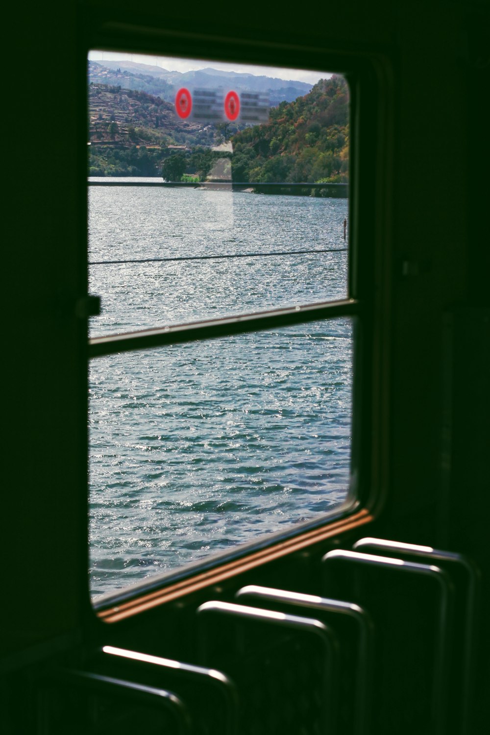 a view of a lake from a window