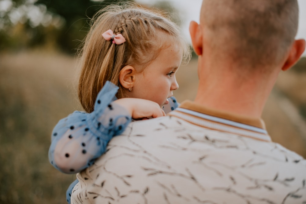 a person holding a baby