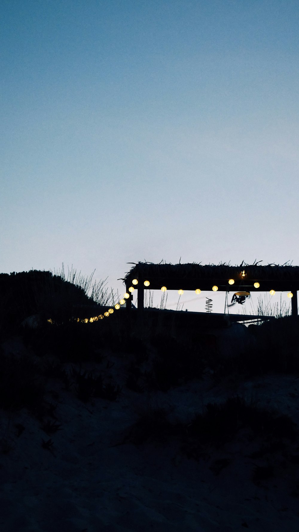 a bridge with lights at night