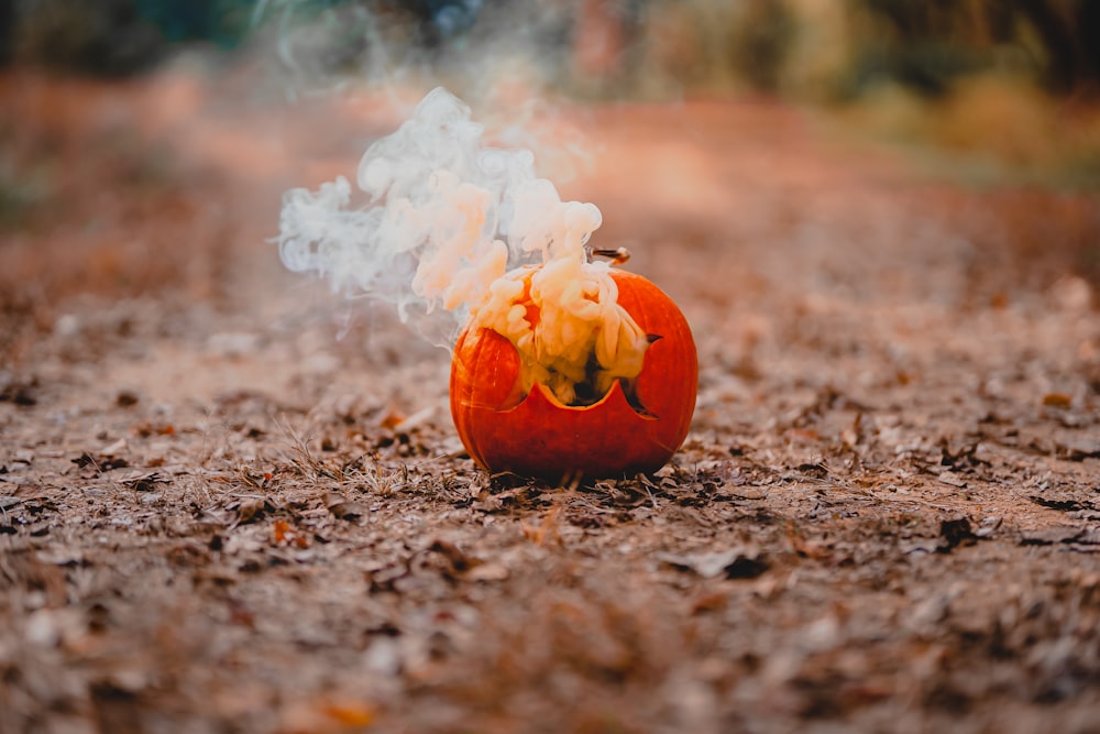 a pumpkin with a face carved in it