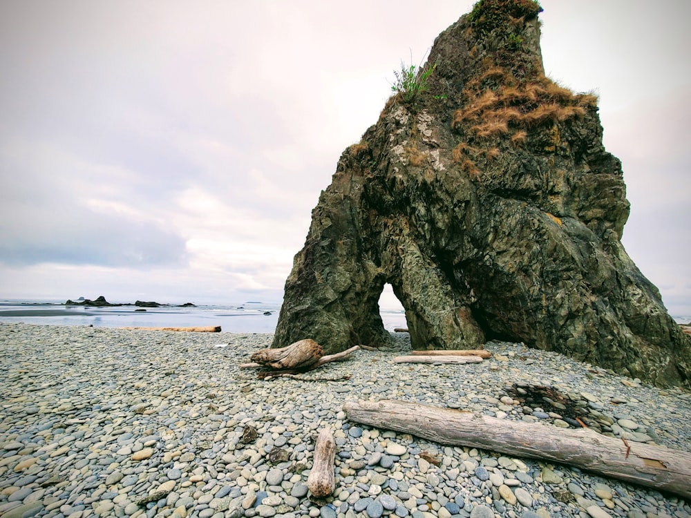 a large rock on a beach