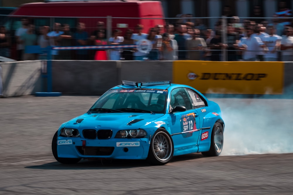 a blue car on a track