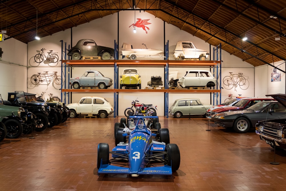 a group of cars in a garage