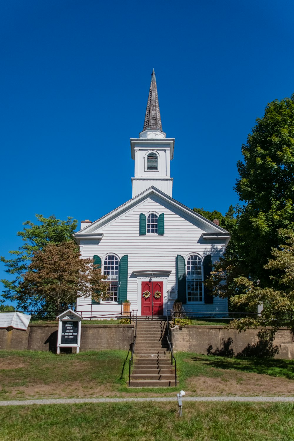 a white church with a steeple