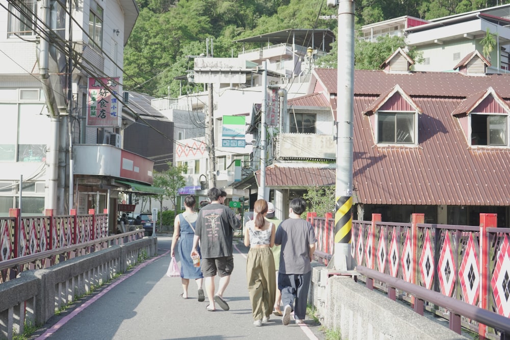 people walking on a sidewalk