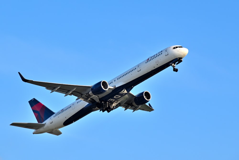 a large airplane flying in the sky