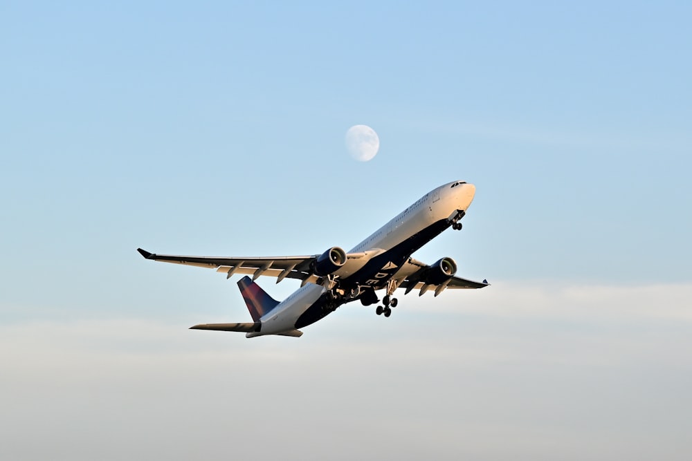 a large airplane flying in the sky