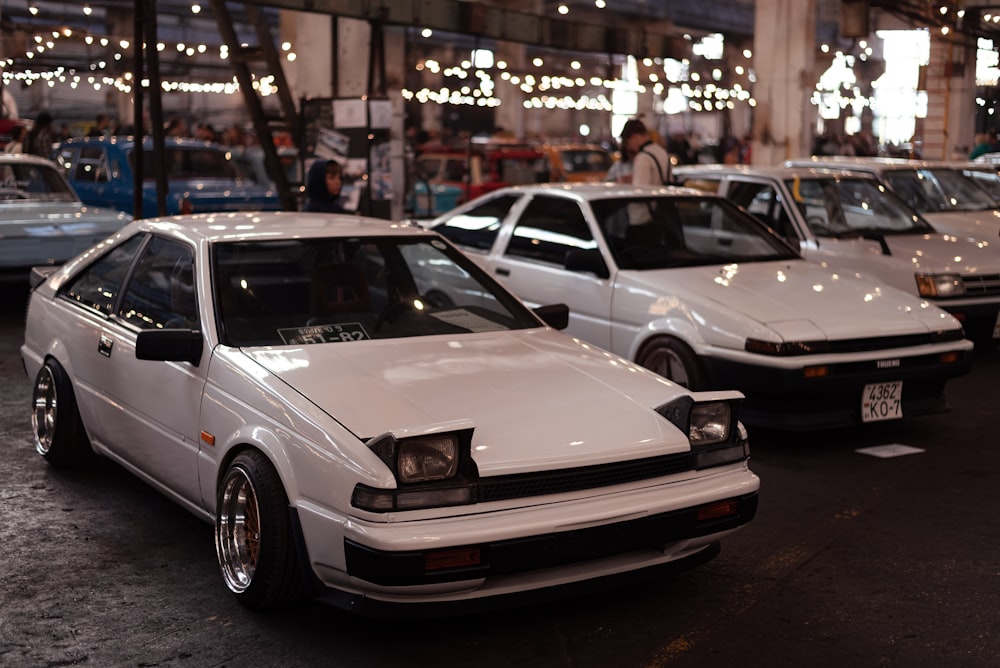 a group of cars parked in a parking lot