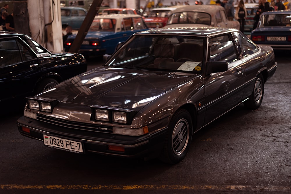 a black car with its doors open