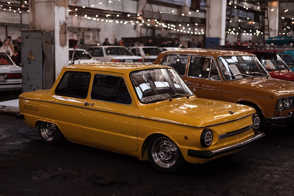 a group of cars parked in a building