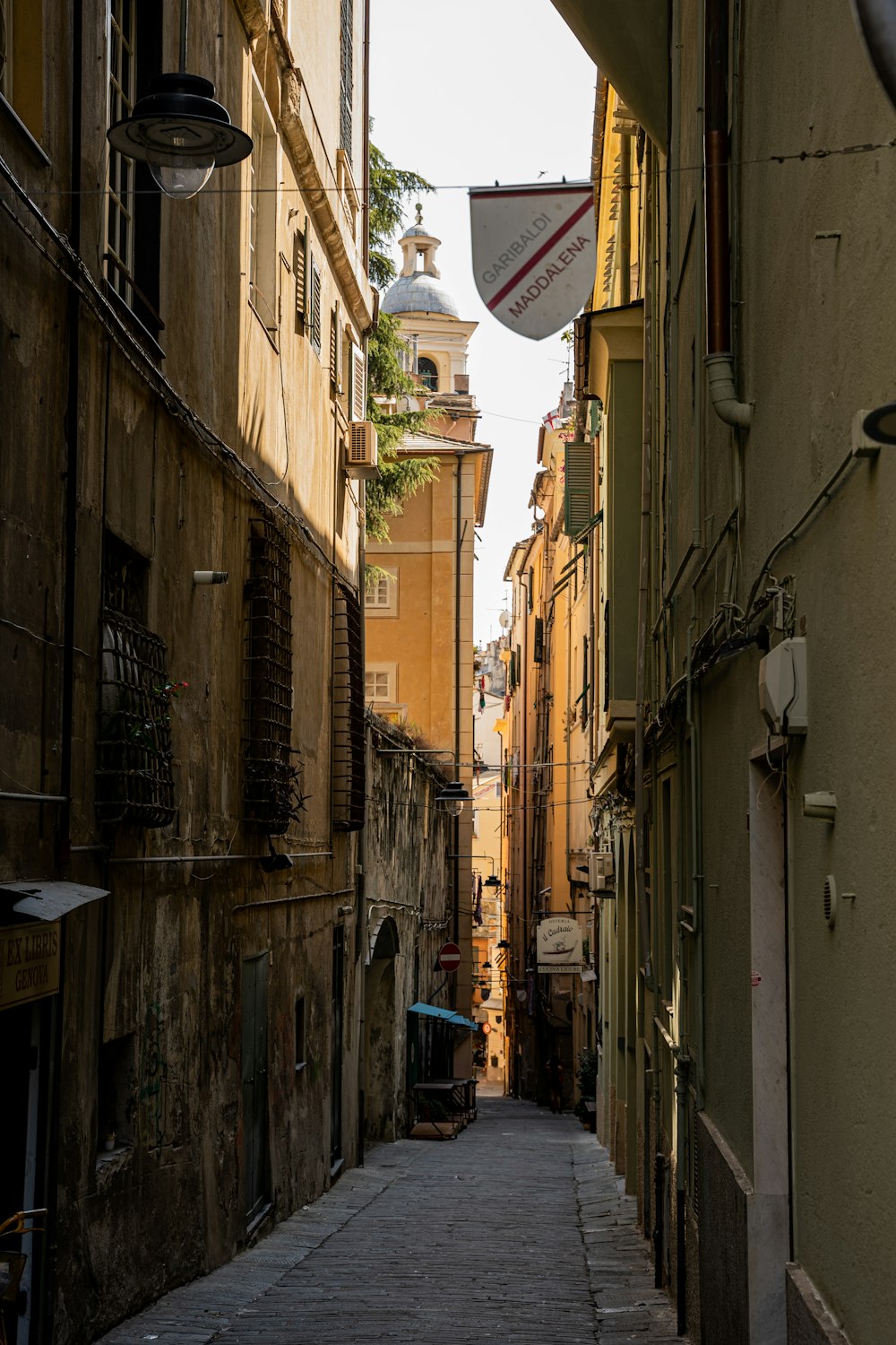 a narrow alley between buildings