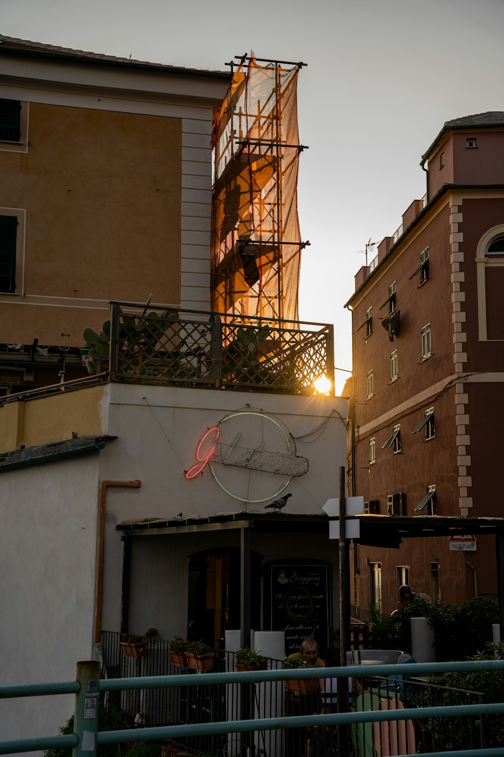 a building with a tower in the background