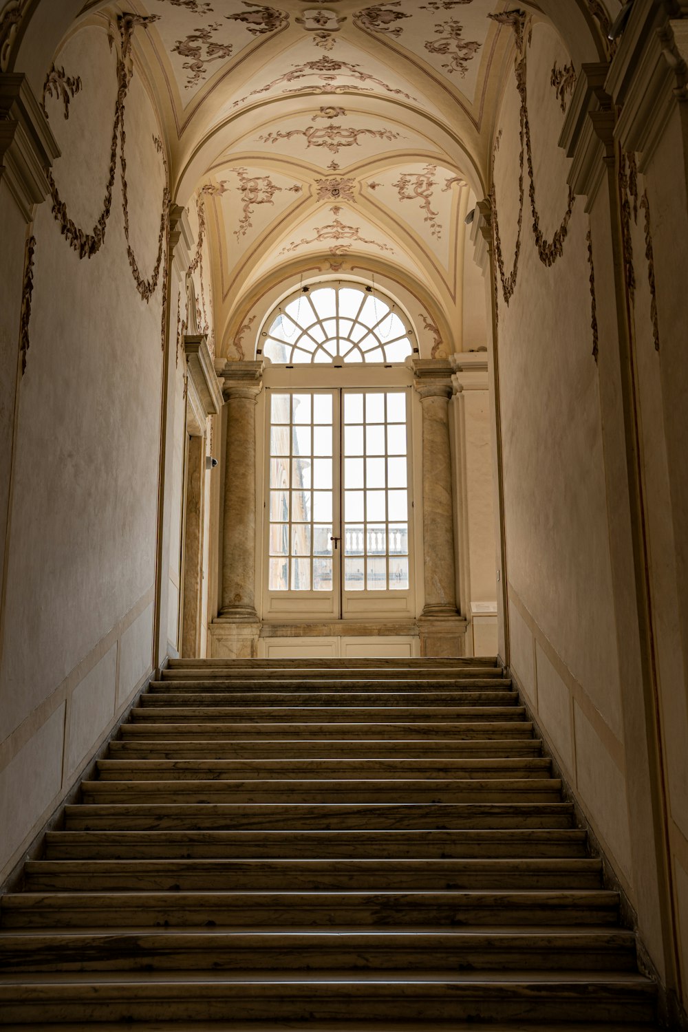 a staircase leading to a window