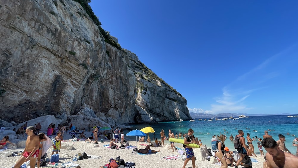 a crowded beach with people