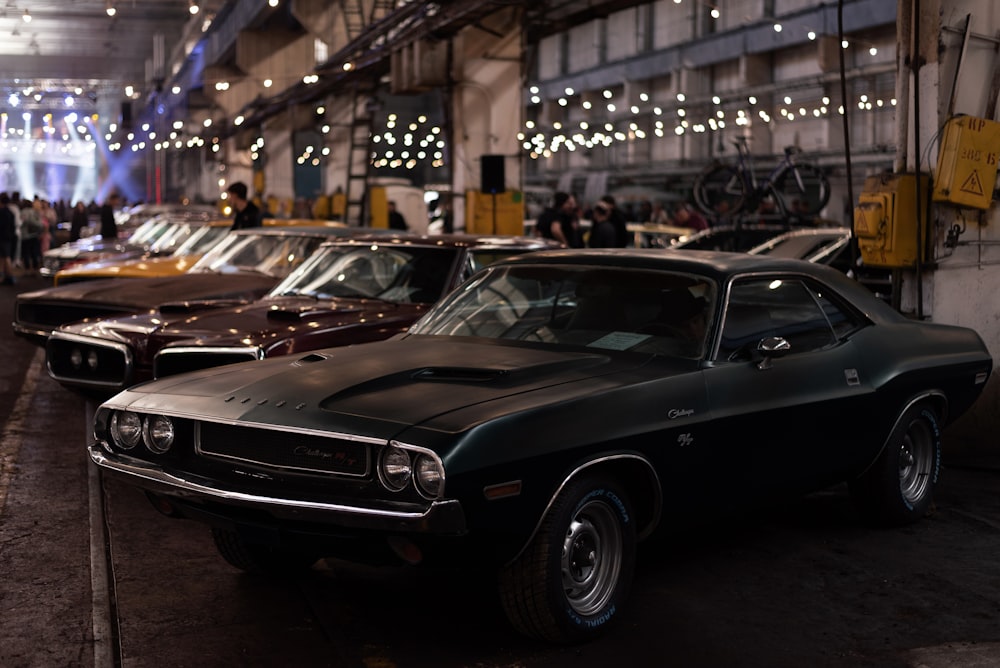 a group of cars parked in a building